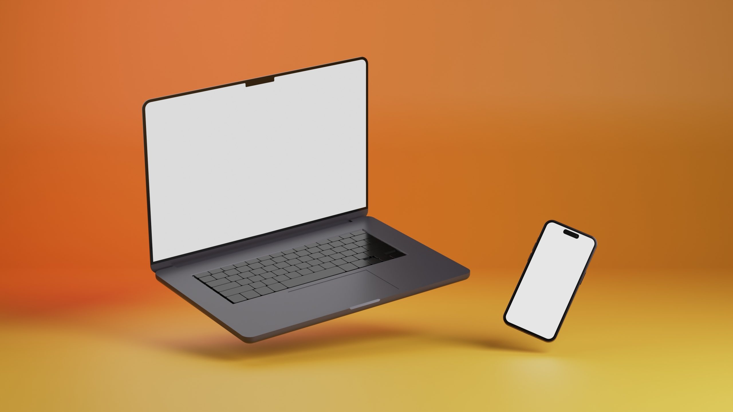 Laptop,And,Smartphone,Isolated,On,Yellow,And,Orange,Gradient,Background.